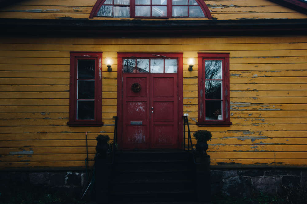 Yellow Home with Red Door